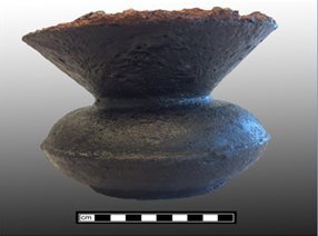 Side view of a cast iron cuspidor from an archaeological site in Baltimore.